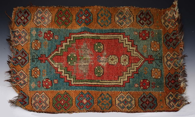 Appraisal: A TURKISH ANATOLIAN YASTIK with a central red ground medallion