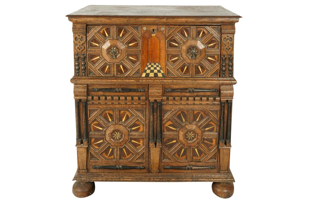 Appraisal: JACOBEAN CARVED INLAID OAK CABINETin two parts the upper part