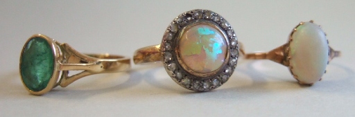 Appraisal: An opal and rose diamond set circular cluster ring a