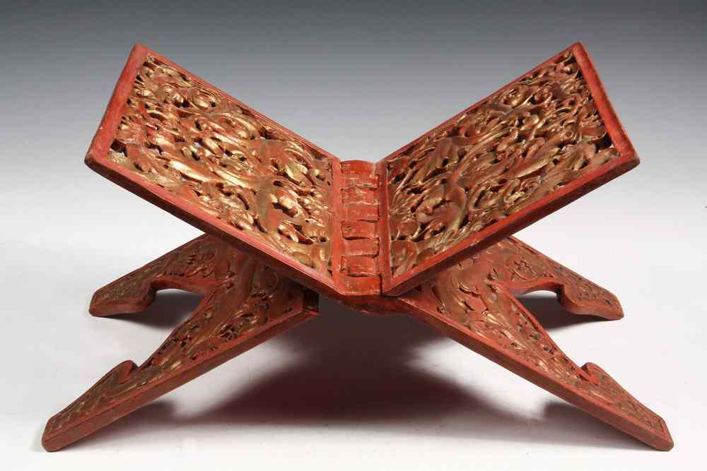 Appraisal: FOLDING QURAN STAND- of polychrome wood with gilding Foliate carving