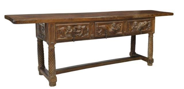 Appraisal: Spanish Baroque style walnut table th c thick single board