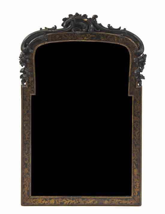 Appraisal: A Louis XV Style Ebonized and Parcel Gilt Mirror having