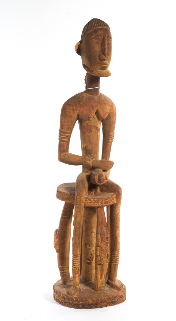 Appraisal: Dogon carved wood figure seated Hogon on stool with reptile