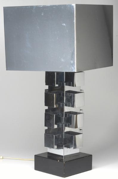 Appraisal: CURTIS JERE Chromed metal table lamp on ebonized wooden base