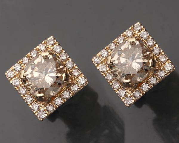 Appraisal: A pair of diamond and k gold earrings central diamonds