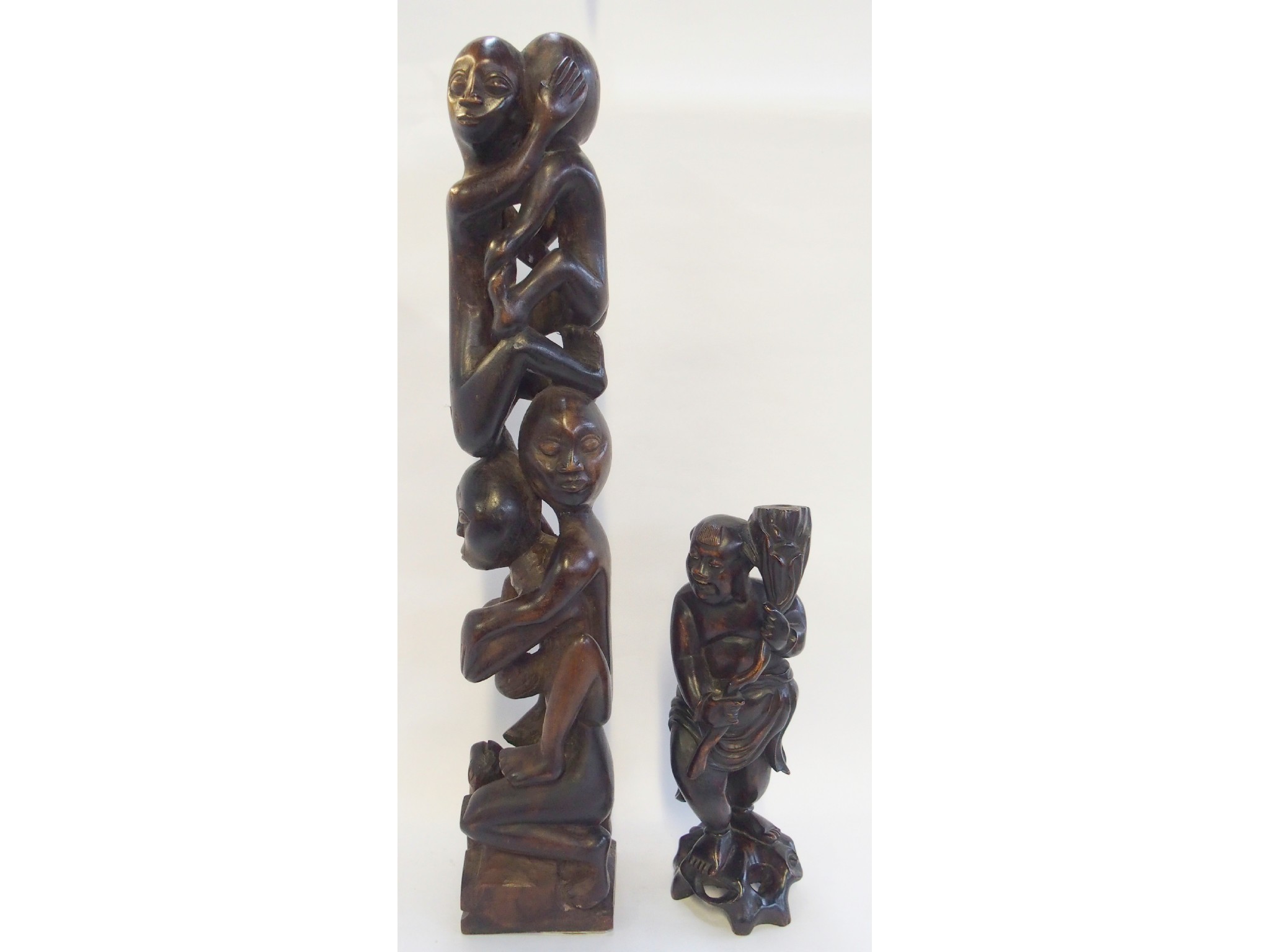 Appraisal: A large African carved wood figural group and a Chinese