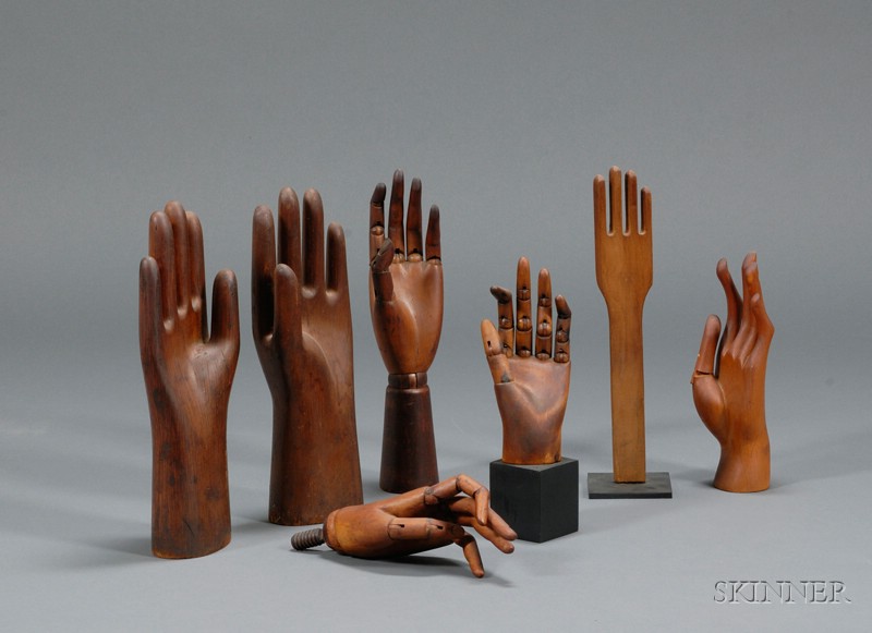 Appraisal: Four Carved Wooden Articulated Artist's Hand Models and Three Glove