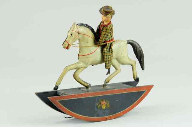 Appraisal: ROCKING HORSE TOY Ives very rare example hand painted tin