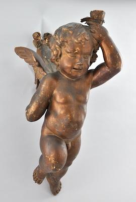 Appraisal: A Large Carved Wood Gilt Putto Measuring approx H x