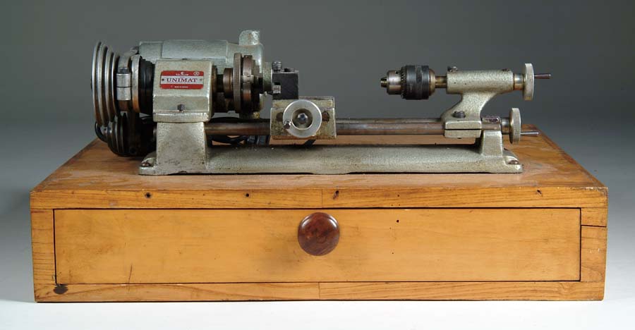 Appraisal: SMALL UNIMAT BENCH LATHE Austrian made tiny lathe with about