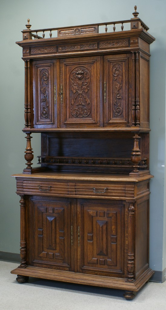 Appraisal: Carved oak Continental part breakfront cabinet spindled galleries reeded columns