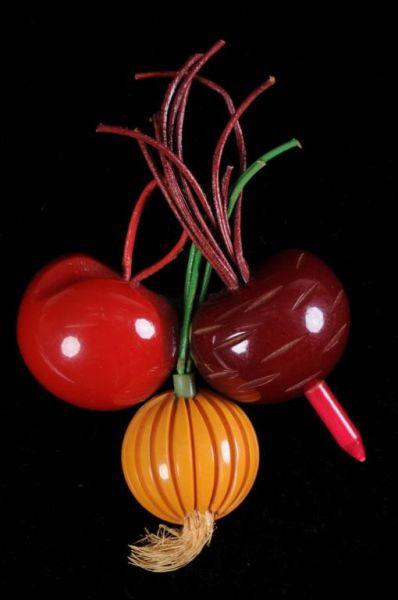 Appraisal: Bakelite Vegetable Pin with Beats Tomato Onion Condition Near Mint