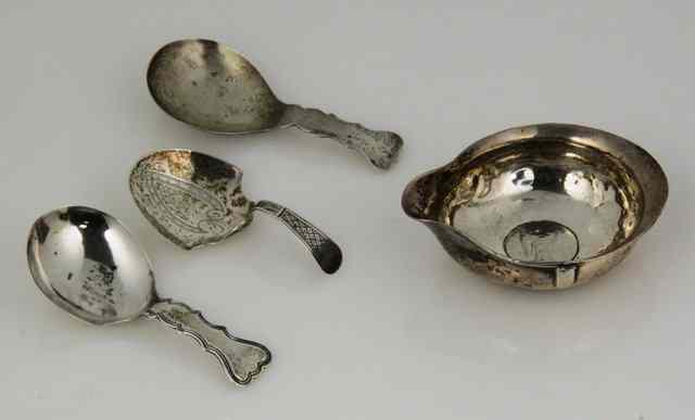 Appraisal: A silver caddy spoon John Betteridge Birmingham another Birmingham with