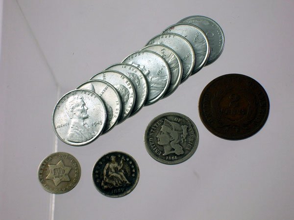 Appraisal: Thirteen assorted small cents to include a two cent piece