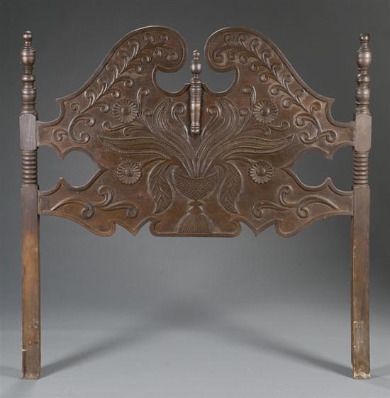 Appraisal: Pennsylvania dutch carved walnut headboard th century Having a vase