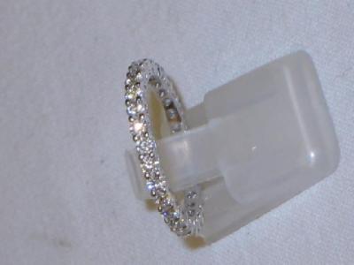 Appraisal: A DIAMOND FULL HOOP ETERNITY RING set with thirty stones