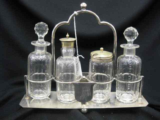 Appraisal: English Silverplate Castor Set four crystal bottles central handle