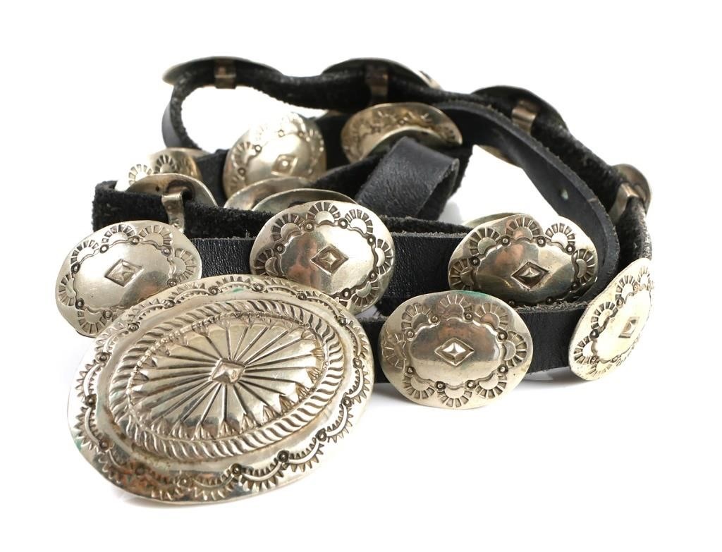 Appraisal: Unmarked vintage sterling silver and black leather concho belt Belt