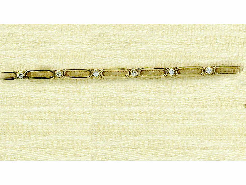 Appraisal: DIAMOND BRACELET k yellow gold oval open link bracelet set