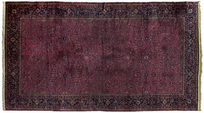 Appraisal: Large hand woven rug repeating floral designs on red field