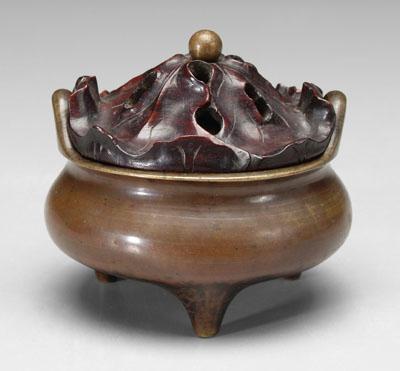 Appraisal: Chinese bronze censer tripod with loop handles wood lid carved