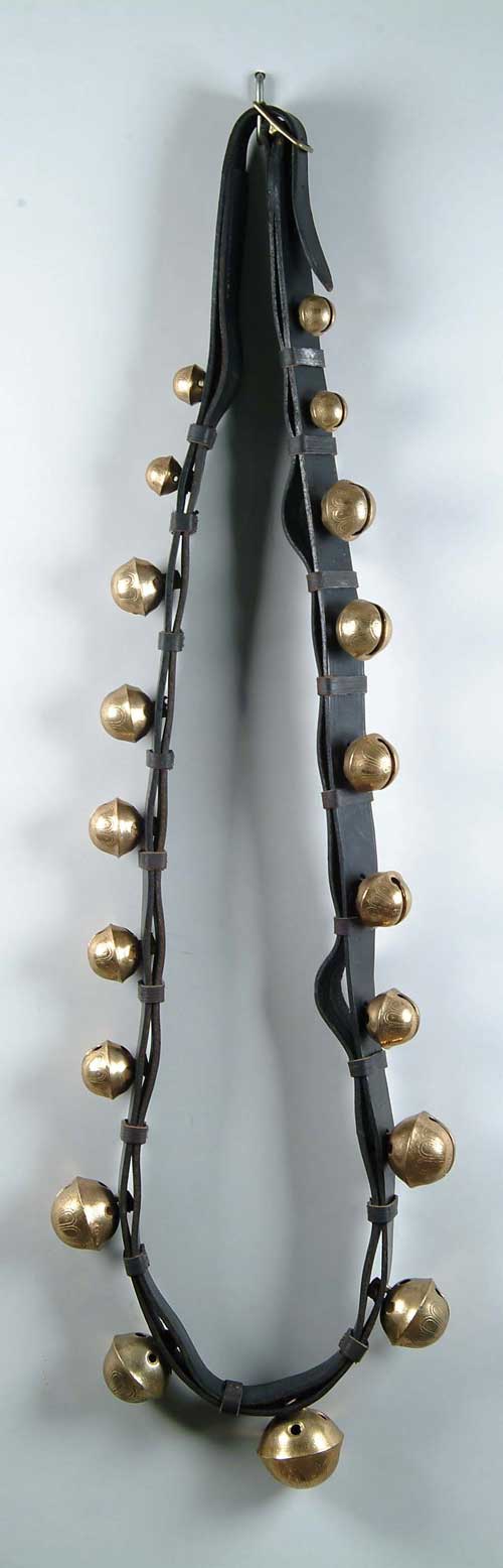 Appraisal: SLEIGH BELLS Long leather strap with bells A graduated set