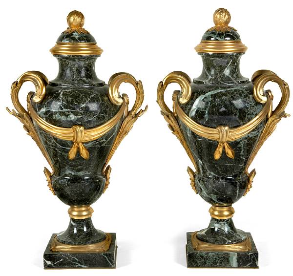 Appraisal: A pair of Louis XVI style gilt bronze mounted marble