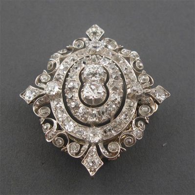 Appraisal: A Victorian diamond set scroll brooch set overall with graduated