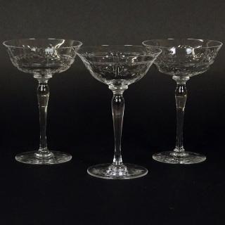 Appraisal: Three Vintage Etched Crystal Champagne Coupes Unsigned Good condition Measures