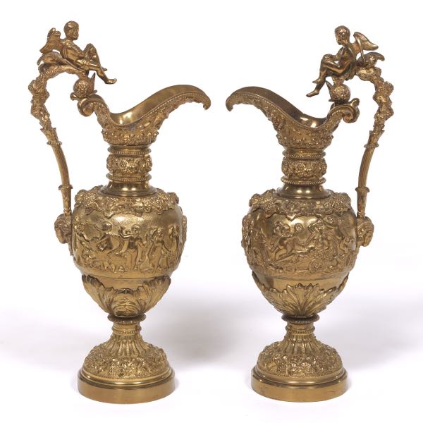 Appraisal: PAIR OF BRASS ROCOCO STYLE DECORATIVE EWERS x x Two