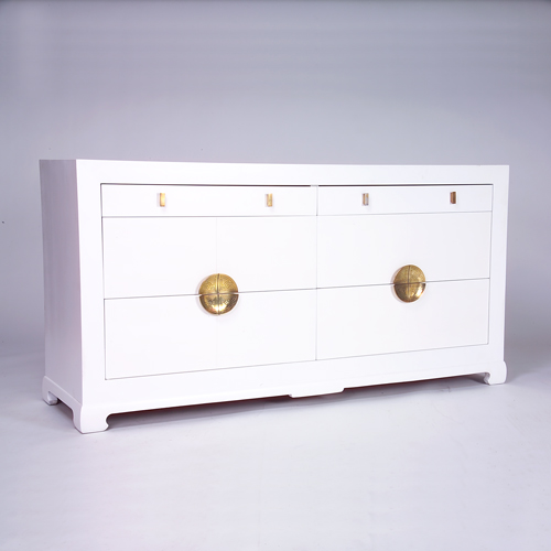 Appraisal: JAMES MONT Six-drawer dresser with white finish and polished brass