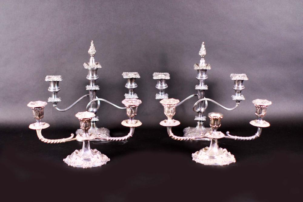 Appraisal: PAIRS OF ENGLISH SILVER PLATE THREE-LIGHT CANDELABRALate th early th