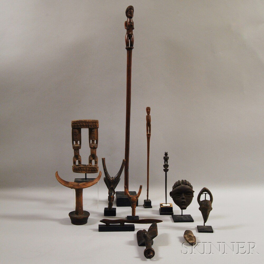 Appraisal: Twelve African Carved Wooden Items Estimate - The absence of