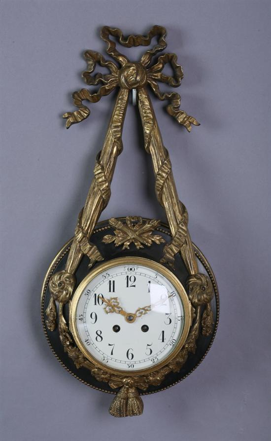 Appraisal: LOUIS XVI STYLE GILT-METAL MOUNTED TOLE WALL CLOCK early th