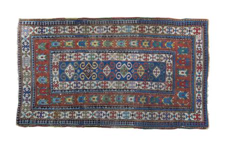 Appraisal: A Kazak rug circa the pale blue field within red