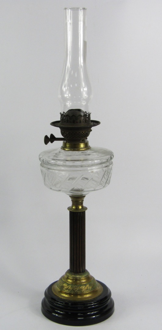 Appraisal: A Duplex brass oil lamp late thC with a cut