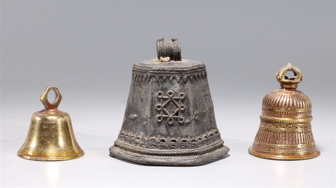 Appraisal: Three antique Indian metal bells of various sizes and designs