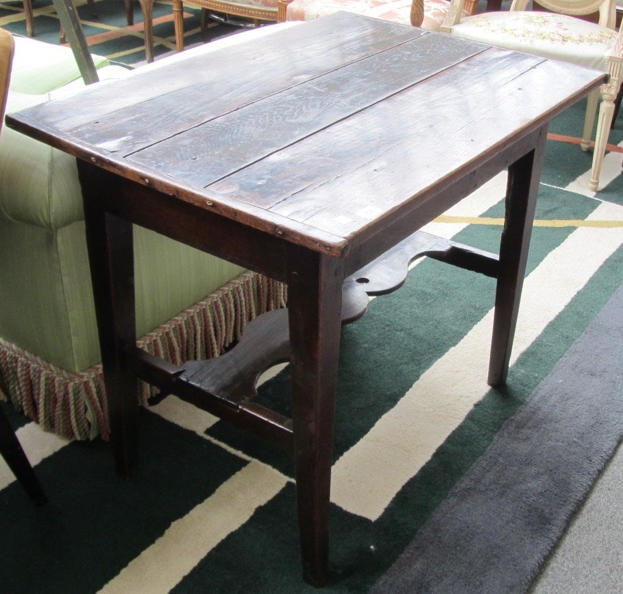 Appraisal: A George III oak centre table rectangular top above single