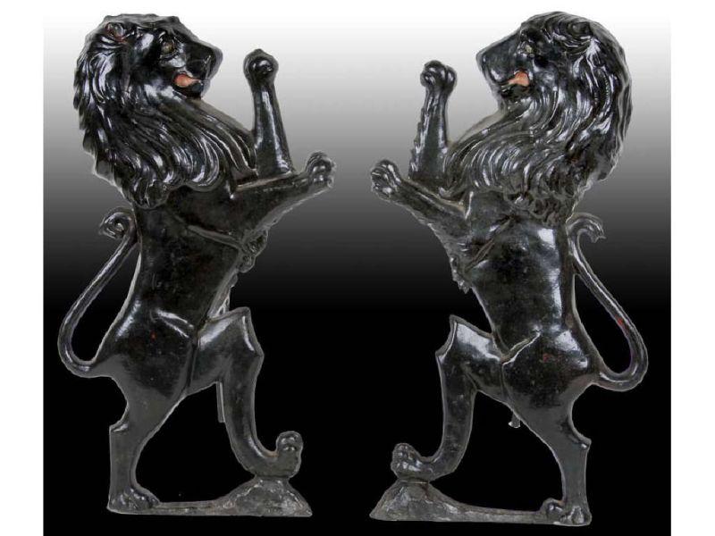 Appraisal: Lion Cast Iron Andirons Description - '' T Depicts lion