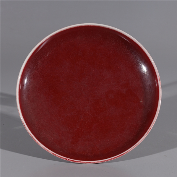 Appraisal: Chinese red glazed porcelain plate overall good condition minor wear