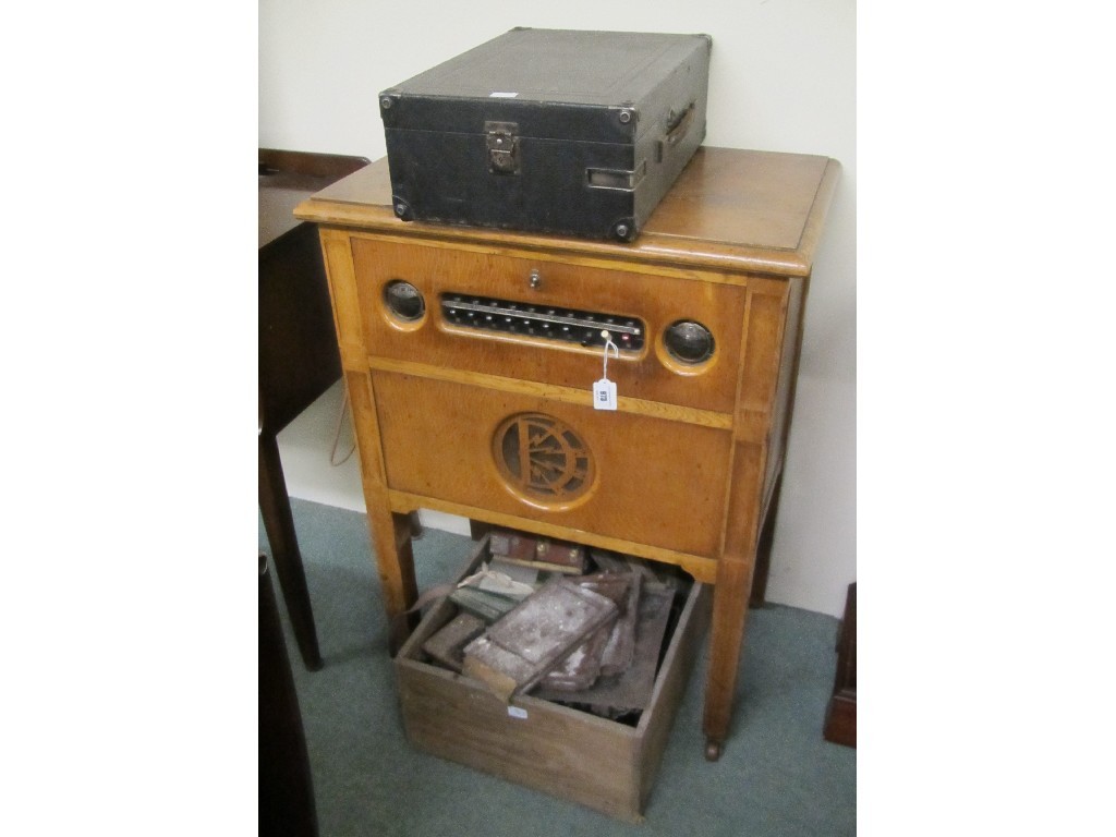 Appraisal: Oak cased dictograph portable gramophone and a box of camera