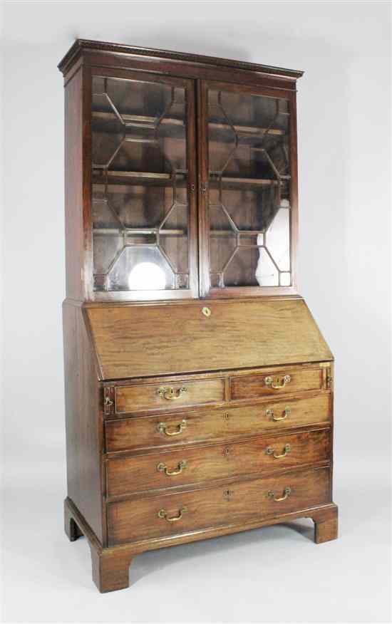 Appraisal: A George III mahogany bureau bookcase with two astragal glazed