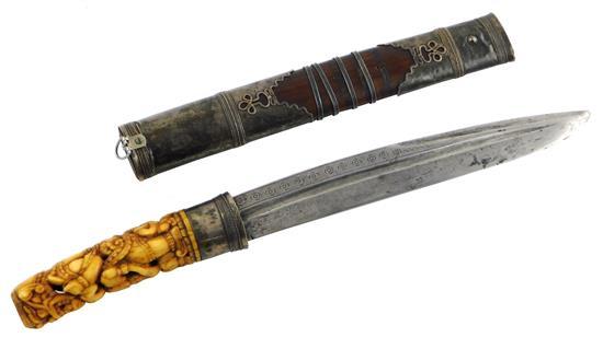 Appraisal: ASIAN Indonesian dagger with carved ivory or bone handle depicting