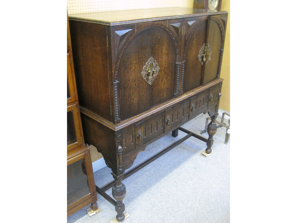 Appraisal: Jacobean style oak cabinet on stand