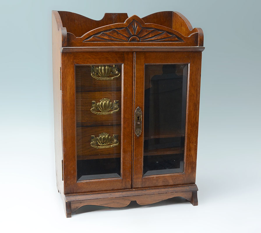 Appraisal: OAK TOBACCO CABINET HUMIDOR WITH GLASS DOORS Top with shaped