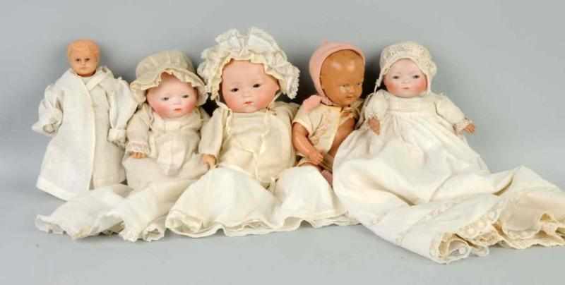 Appraisal: Lot of Celluloid and Bisque Dolls Description Bye-Lo Babies with