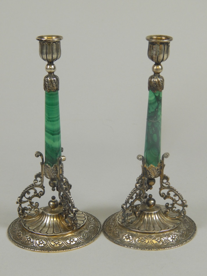 Appraisal: A pair of Asprey Co silver mounted candlesticks each with