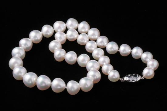 Appraisal: GRADUATED WHITE SOUTH SEA BAROQUE PEARL NECKLACE baroque pearls ranging