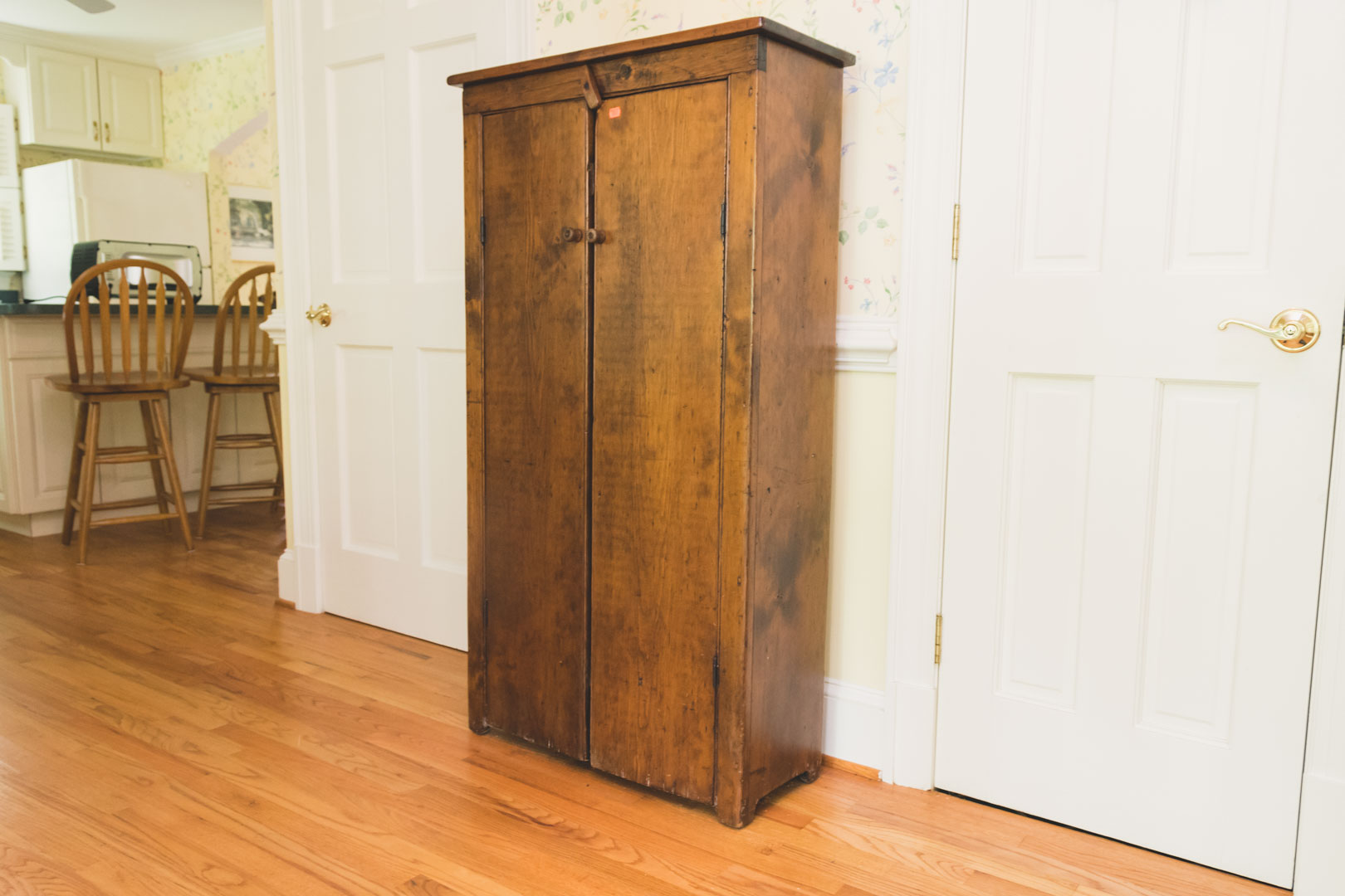 Appraisal: American primitive two-door cupboard in H in W in D