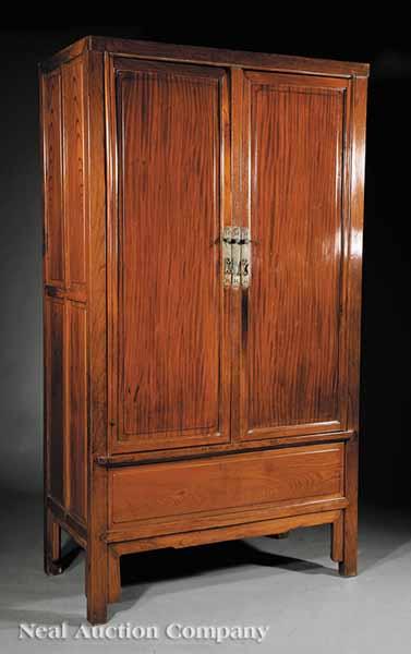 Appraisal: An Antique Chinese Hardwood Cabinet th c rectangular paneled doors